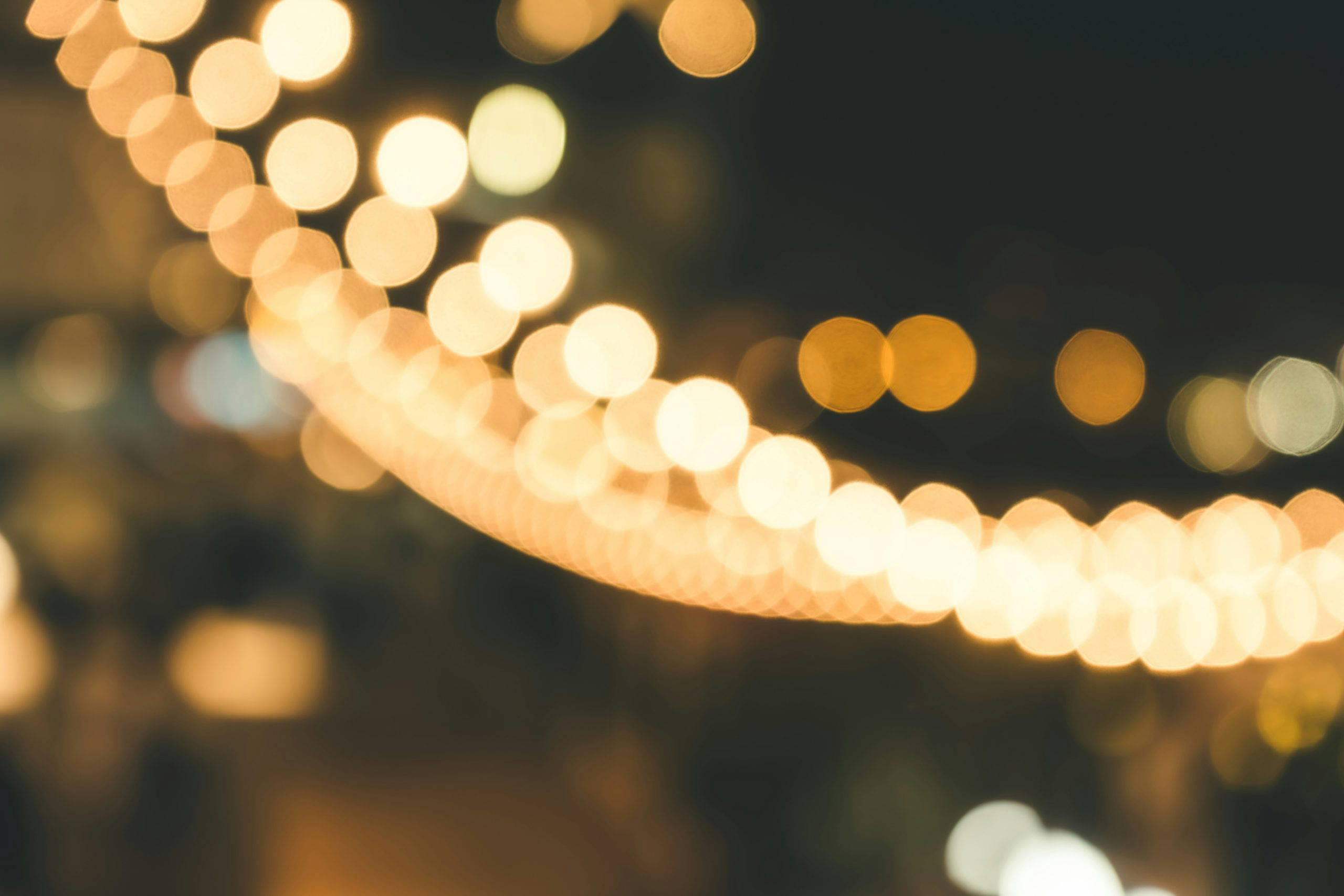 A blurred image of string lights.